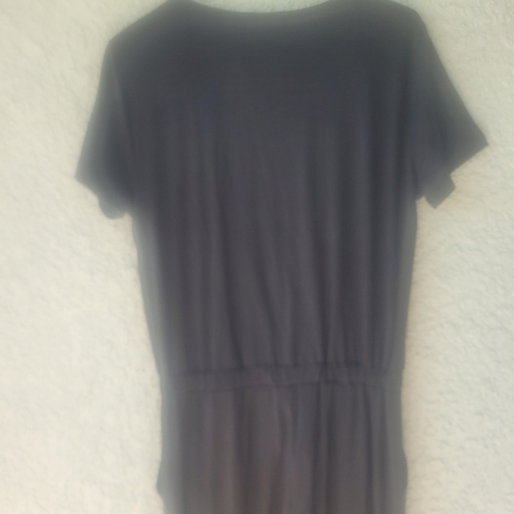 Sophisticated Black Wrap-Style Jumpsuit with Tapered Legs - Picture 7 of 14